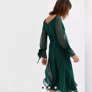ASOS DESIGN midi dress with layered skirt and wrap waist with lace trim detail
